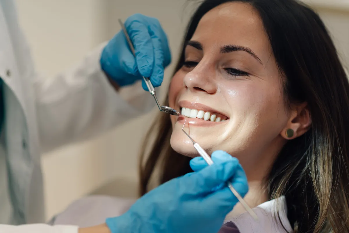 Woman receiving oral pathology evaluation for mouth tissue check at Access Oral Surgery